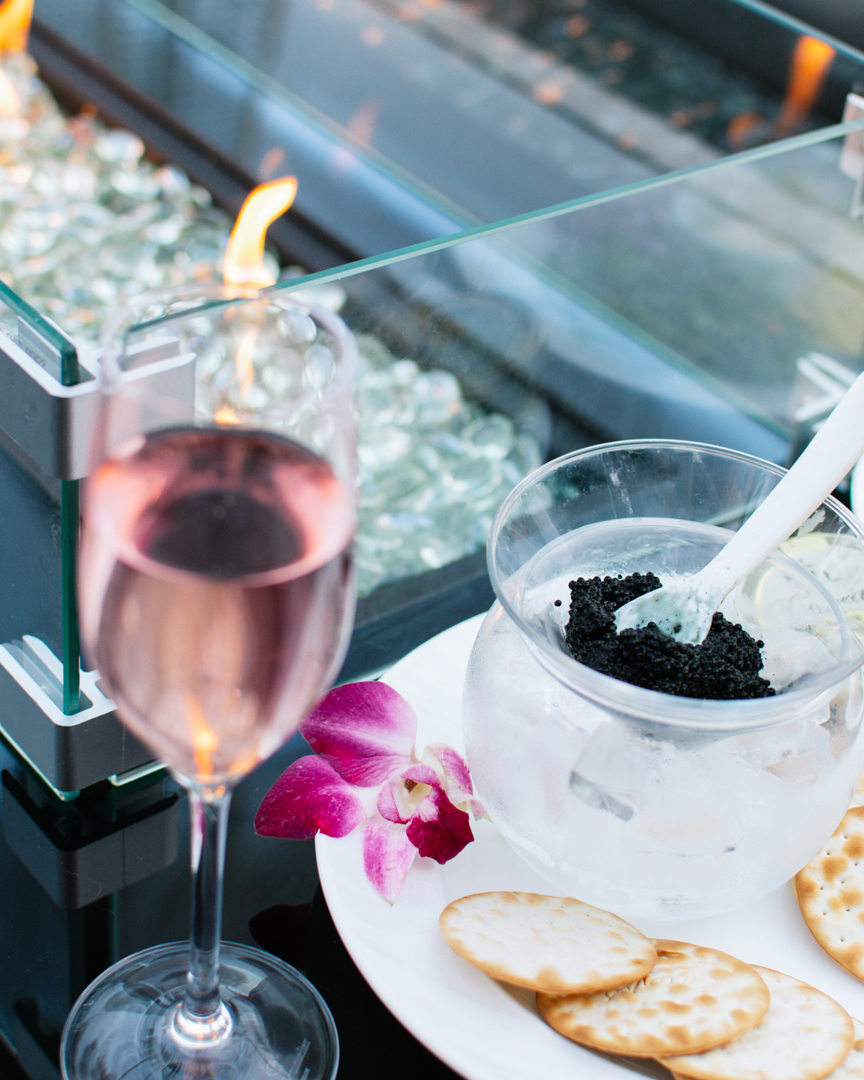 Caviar and champagne outside at Flute & Dram on Beach Drive in St. Petersburg, Florida